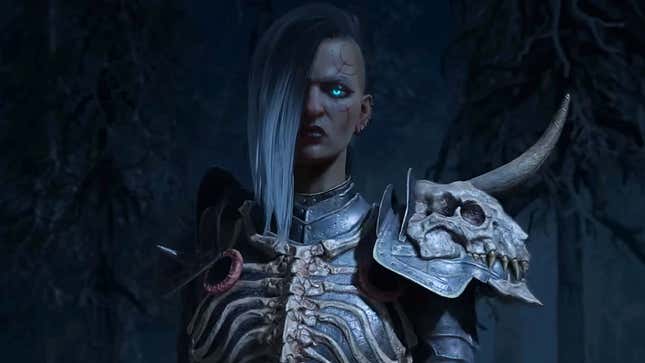 A necromancer character is seen with glowing blue eyes.